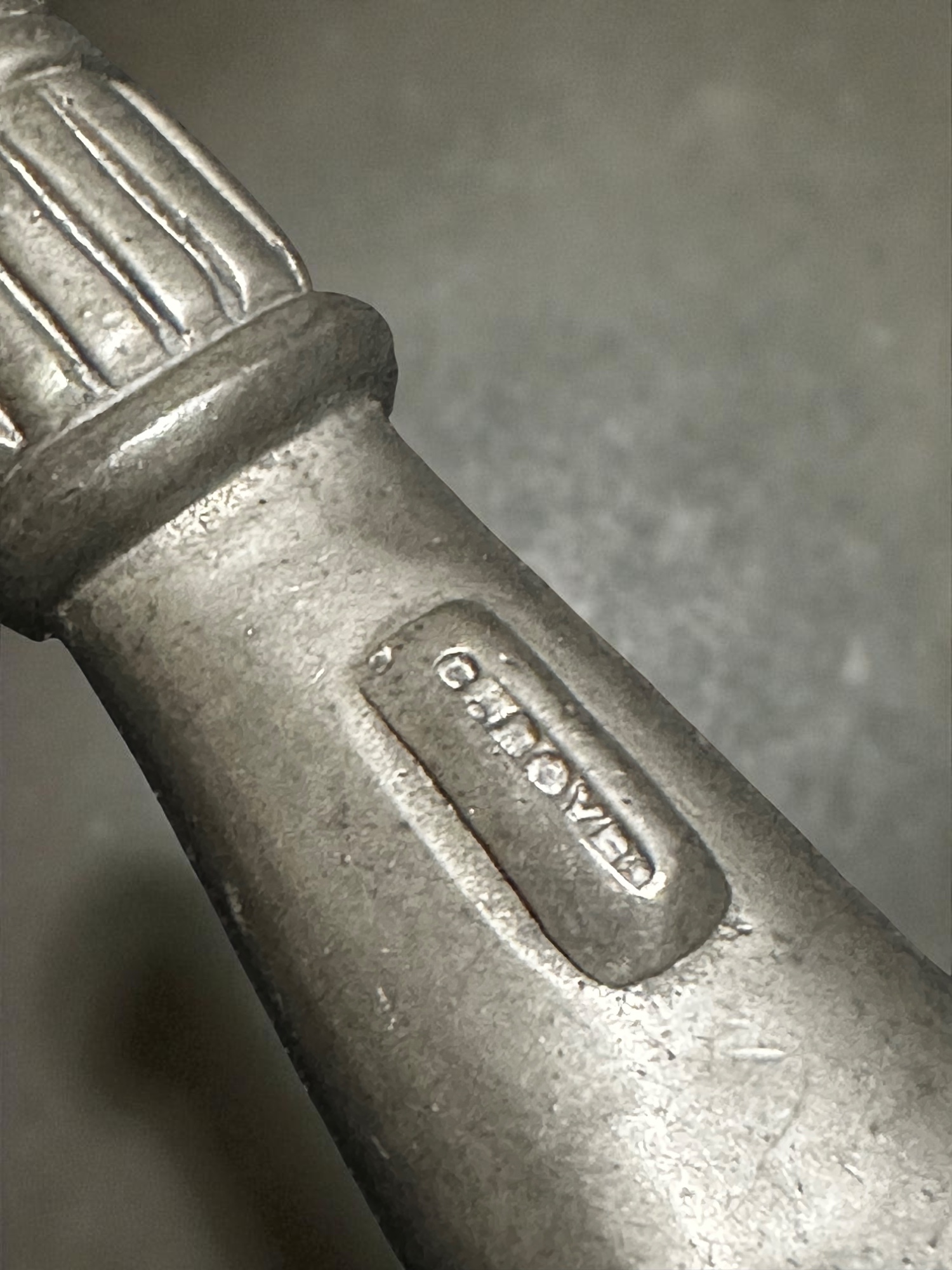 G. BOYES stamp close-up on pewter handle